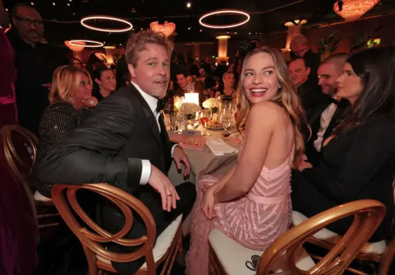 Pictures of Margot Robbie and Brad Pitt