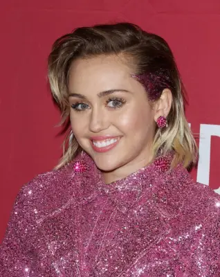 Miley Cyrus at ONE Campaign and (RED)