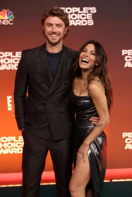 December 2021: Sarah Shahi and Adam Demos Make Their Red Carpet Debut