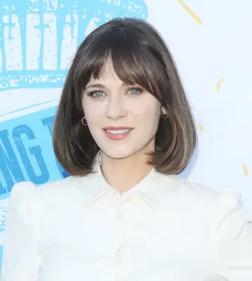 Celebrities With Bangs: Zooey Deschanel With Curtain Bangs