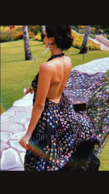 The Halter Style Dress Looked Lovely With Dangling Earrings