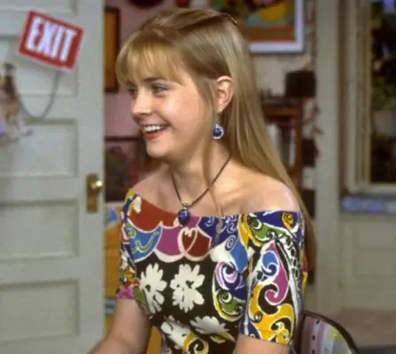 An off-the-shoulder top is a flattering choice.