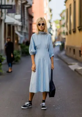 With a Simple Turtleneck Dress and Handbag