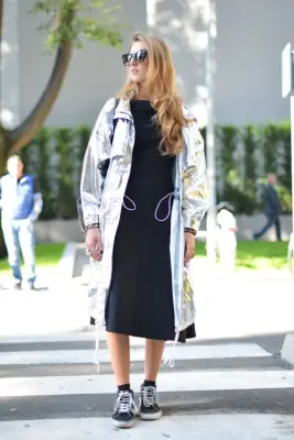 With a Metallic Coat and Simple Black Dress