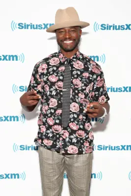 Taye Diggs as Coach Billy Baker