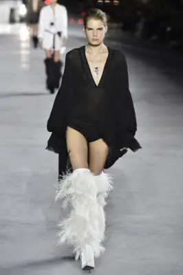 The Boots Are From Saint Laurent