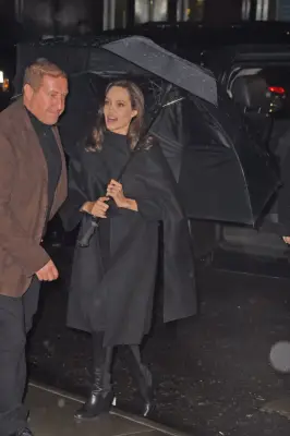 A Caped Poncho Makes For a Chicer Raincoat