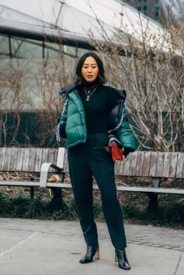 Style Your Black Ankle Boots With a Bright Green Puffer