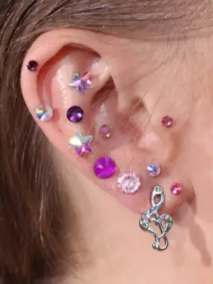 BURBANK, CALIFORNIA - JULY 27: JoJo Siwa, earring detail, attends Disney+ 