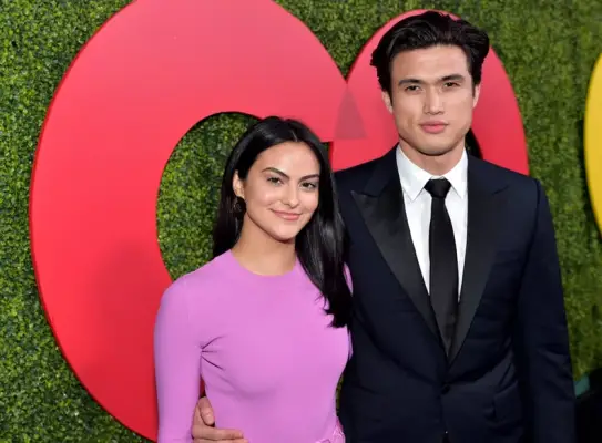 BEVERLY HILLS, CA - DECEMBER 06: Camila Mendes (L) and Charles Melton attend the 2018 GQ Men of the Year Party at a private residence on December 6, 2018 in Beverly Hills, California. (Photo by Stefanie Keenan/Getty Images for GQ)