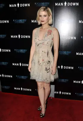 Mara might also go for something fun and embroidered like this Dior dress.