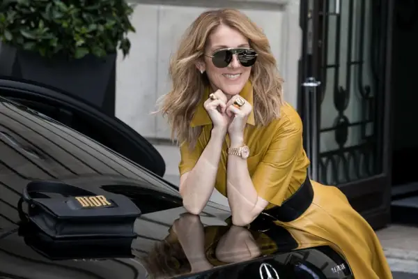 When She Showed Off Her Dior Bag on Top of a Mercedes-Benz