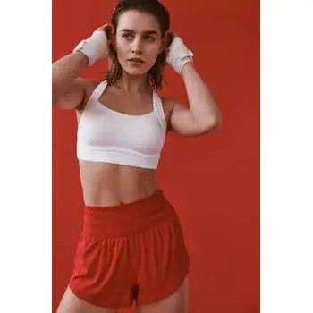 Woman wearing Free People Runsie