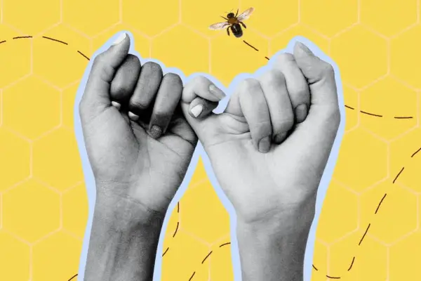 An image shows a cutout of two hands holding each other