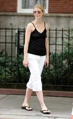 Gwyneth Paltrow Wearing a Black Tank Top and White Shorts