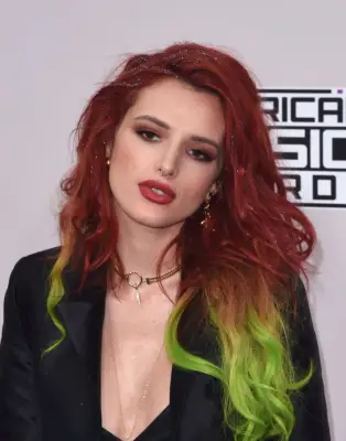 Bella Thorne With Dark Red Hair and Green Ends
