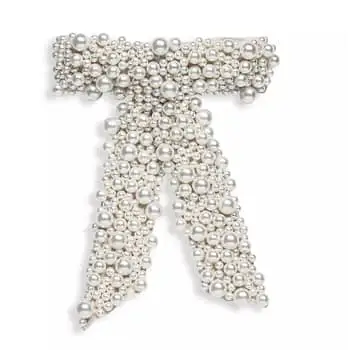 hair bow trend, celebrities wearing hair bows, nicole kidman in a hair bow at met gala 2023