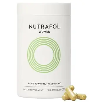 Author with hair middle-parted and styled with loose waves