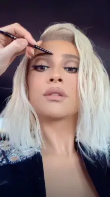 Her Glam Squad Finished Her Brows While Heading to the Award Show