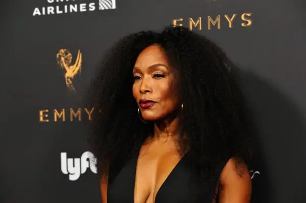 Hairstyles That Make You Look Younger: Long Coils