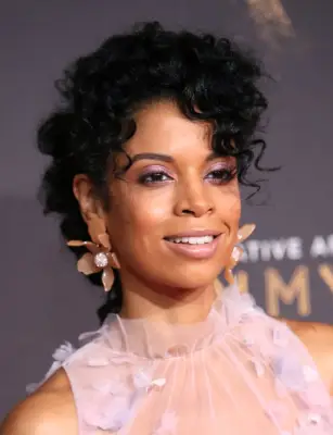 Hairstyles That Make You Look Younger: Curly Bangs