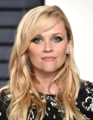 Hairstyles That Make You Look Younger: Side-Swept Bangs