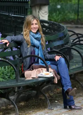 Jen Always Seems to Wrap a Scarf Around Her Neck When She