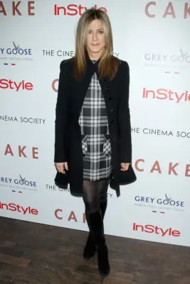 Try Your Tights With a Plaid Dress and Knee-High Suede Boots