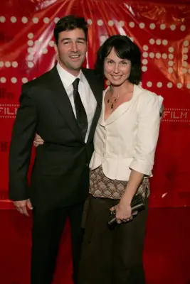 When He Looked So Happy Beside His Wife