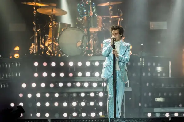 Harry Styles Wearing a Blue Gucci Suit in 2018