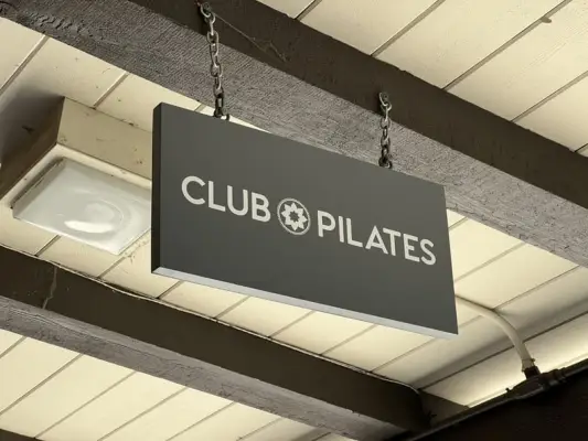 Sign for Club Pilates, a pilates gym in Lafayette, California, how much does Club Pilates cost?