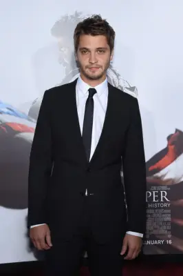 Luke Grimes as Elliot Grey