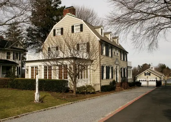 NEW YORK - MARCH 31: Real estate photograph of a house located at 112 Ocean Avenue in the town of Amityville, New York March 31, 2005. The Amityville Horror house rich history and beauty are overshadowed by the story of George and Kathy Lutz, the previou