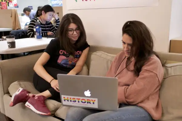 Nichole Sessego (left), Regional Digital Director, mid-20s