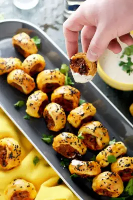 Chorizo, Caramelized Onion, and Poblano Sausage Rolls With Creamy Cilantro Dip