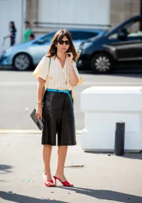 Style Leather Shorts With a Striped Shirt and Red Heels