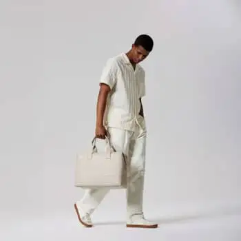 The Nex Pioneer Carry-On Suitcase standing upright and opened.