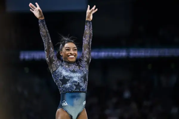 PARIS, FRANCE - JULY 28: Simone Biles from Team United States reacts after her exercise on the balance beam during day two of the Olympic Games Paris 2024 at the Bercy Arena on July 28, 2024 in Paris, France. (Photo by Tom Weller/VOIGT/GettyImages)