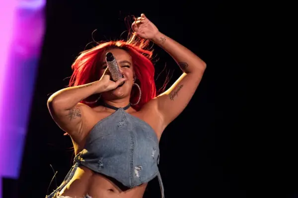 Karol G’s 200 Copas Wrist Tattoo