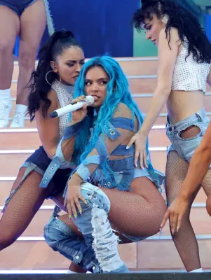 Karol G’s AR Finger Tattoo