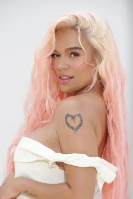 Karol G’s Heart Tattoo