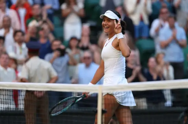 LONDON, ENGLAND - JULY 02: Emma Raducanu of Great Britain gestures with a peace sign as she celebrates her victory against Marketa Vondrousova of Czechia during the Ladies