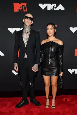September 2021: Travis Barker and Kourtney Kardashian Make Their Red Carpet Debut