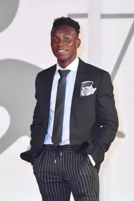 Olly Sholotan as Carlton Banks