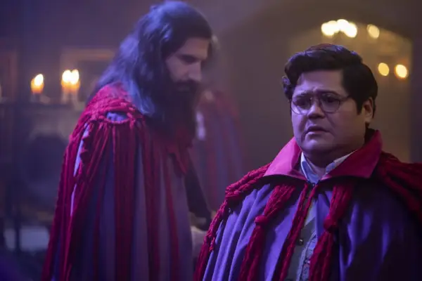 WHAT WE DO IN THE SHADOWS -- Exit Interview -- Season 5, Episode 10 (Airs August 31) — Pictured (L-R): Kayvan Novak as Nandor, Harvey Guillén as Guillermo. CR: Russ Martin/FX
