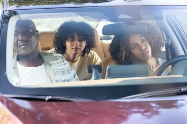 Delroy Lindo as Edwin, Kerry Washington as Paige, and Faly Rakotohavana as Finn in Hulu