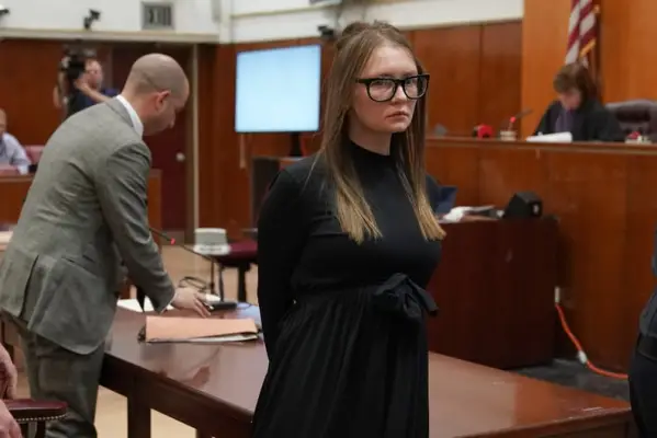 Fake German heiress Anna Sorokin is led away after being sentenced in Manhattan Supreme Court May 9, 2019 following her conviction last month on multiple counts of grand larceny and theft of services. (Photo by TIMOTHY A. CLARY / AFP) (Photo credi