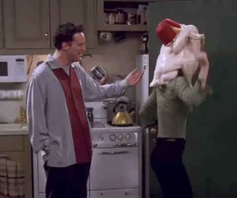 Monica Wearing a Turkey on Her Head