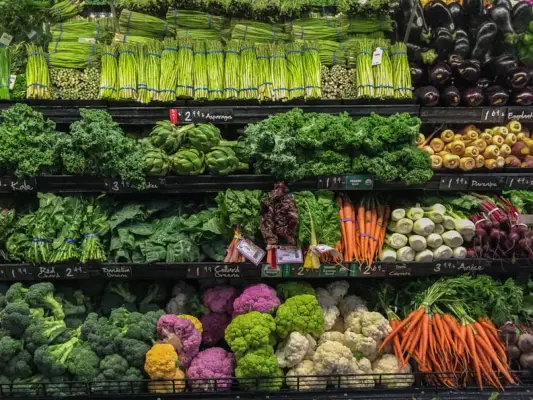 View of well ordered vegetables for sale in a supermarket